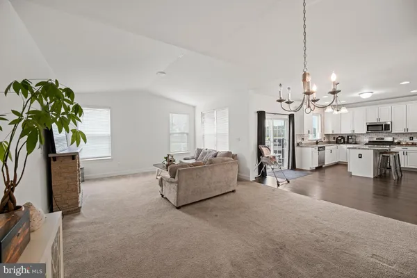 a living room with furniture and a couch