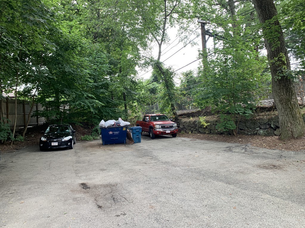 94 Beaconsfield Road, Unit 202 Brookline, MA 02445 - Photo 13 of 21 a view of car parked in a parking lot