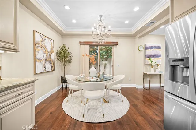 a view of dining room with furniture and a window