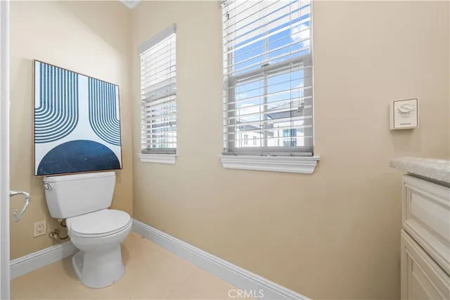 a bed room with a bed and window