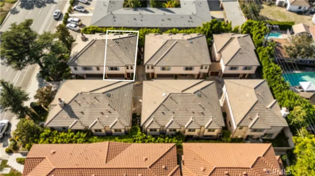 a view of a city with mountains in the background