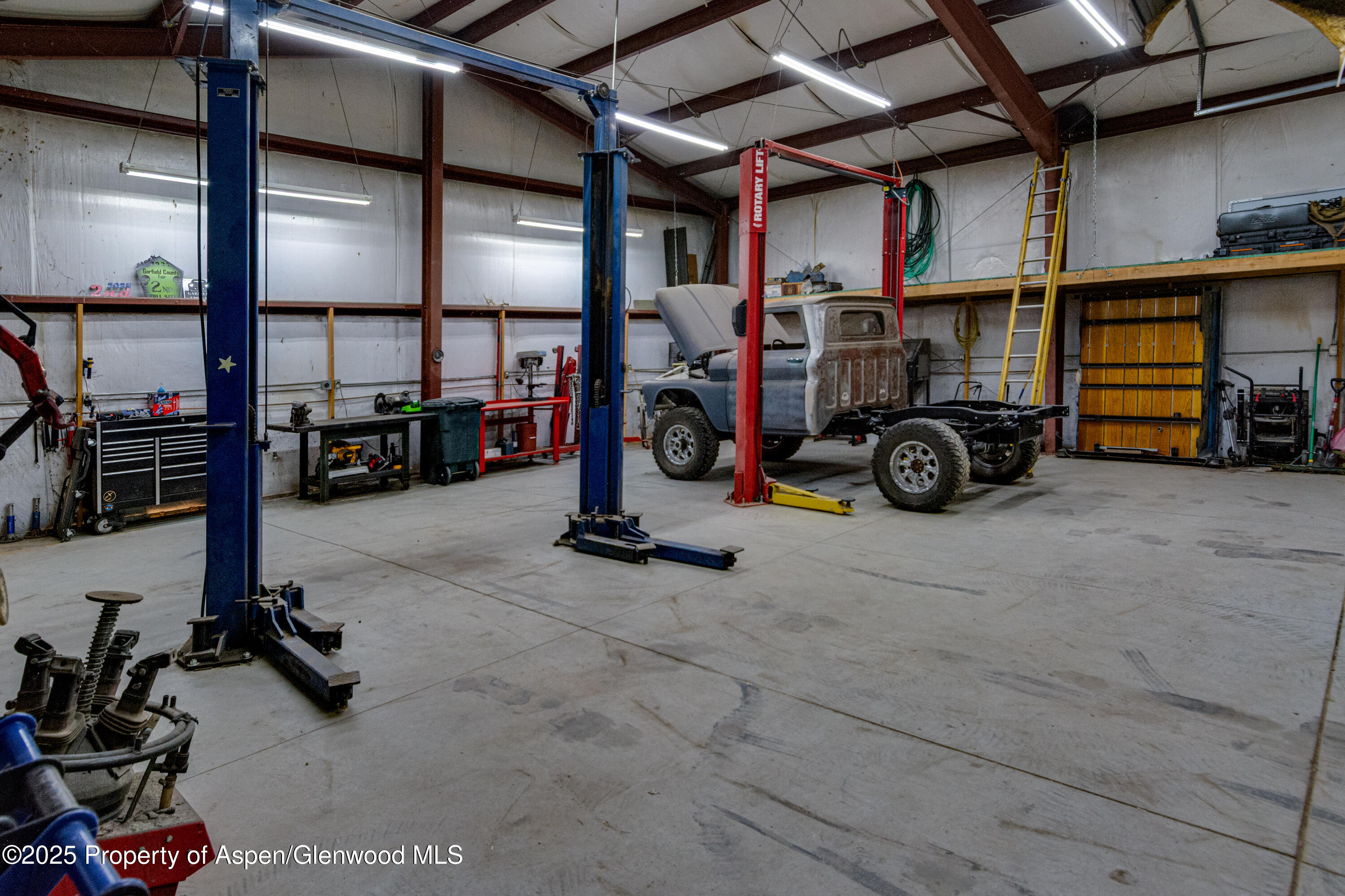 114 Rusty Spur Trail Rifle, CO 81650 - Photo 6 of 47 a view of a garage with storage