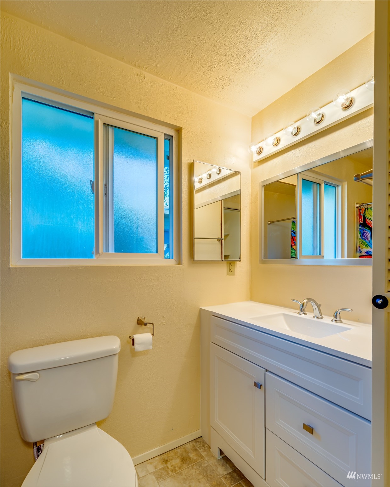 809 Dyer Road Sultan, WA 98294 - Photo 11 of 39 a bathroom with a toilet sink and mirror