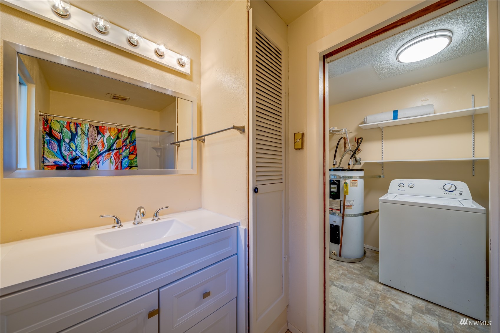 809 Dyer Road Sultan, WA 98294 - Photo 12 of 39 a view of bathroom with a washer and dryer