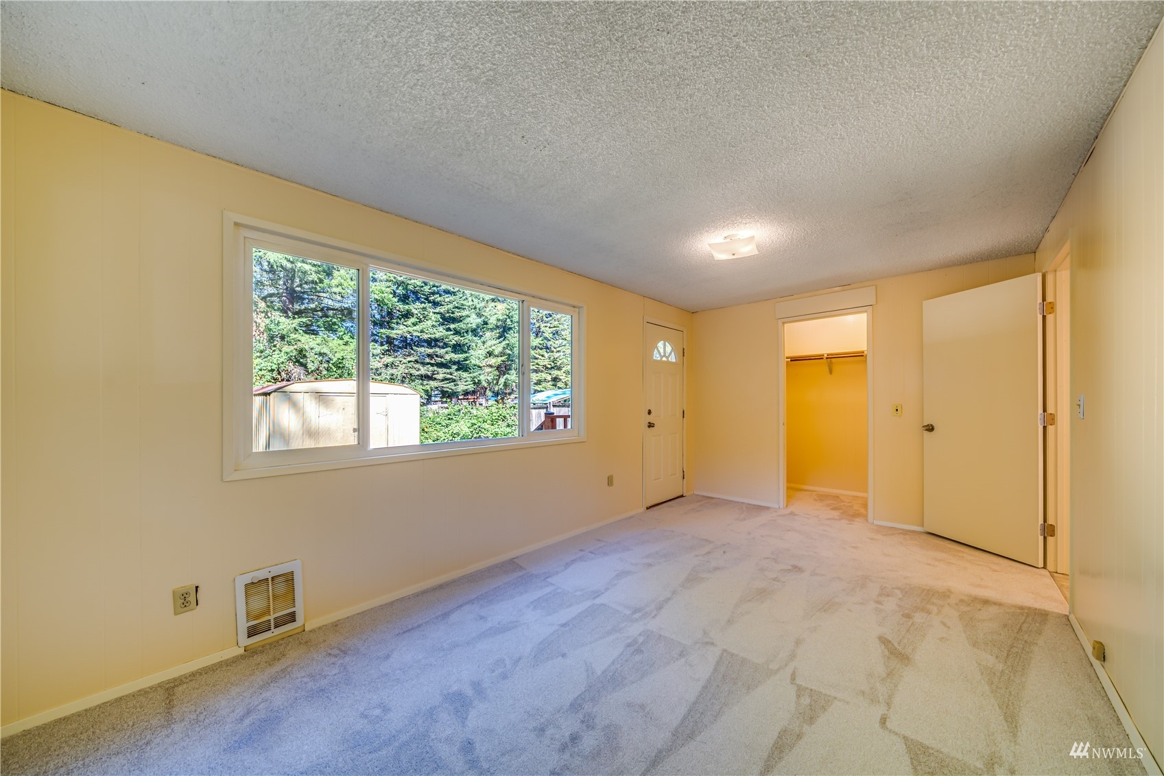 809 Dyer Road Sultan, WA 98294 - Photo 14 of 39 a view of an empty room with a window