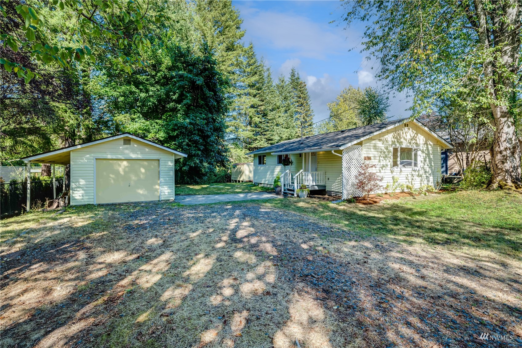 809 Dyer Road Sultan, WA 98294 - Photo 2 of 39 a view of a house with yard and a garden