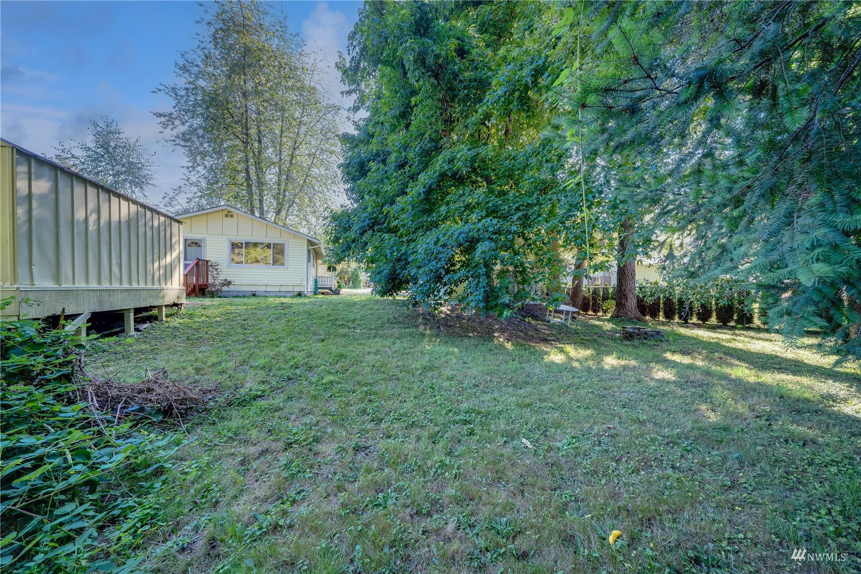 809 Dyer Road Sultan, WA 98294 - Photo 23 of 39 a view of a house with backyard and garden