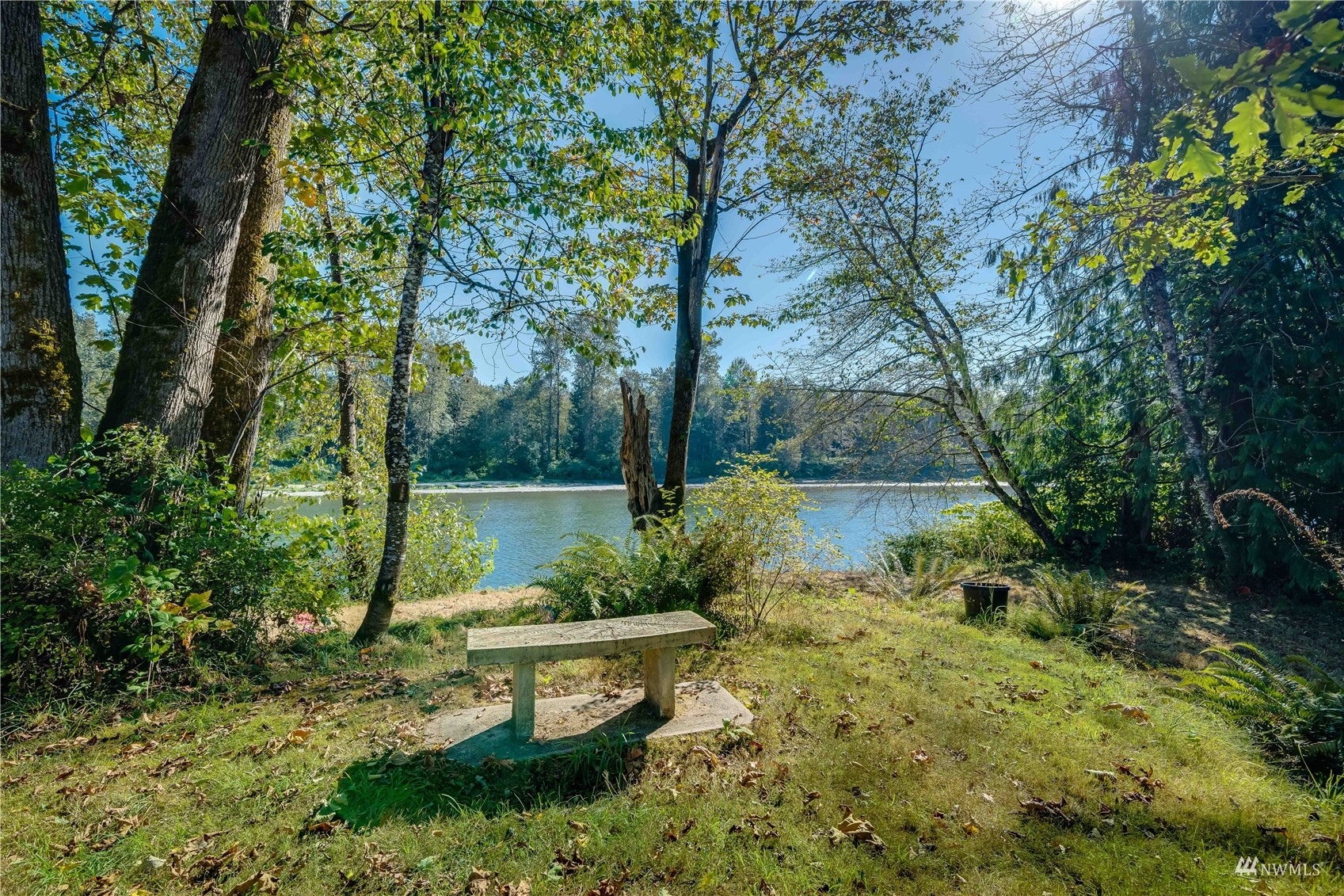 809 Dyer Road Sultan, WA 98294 - Photo 29 of 39 a view of a garden with plants and large trees