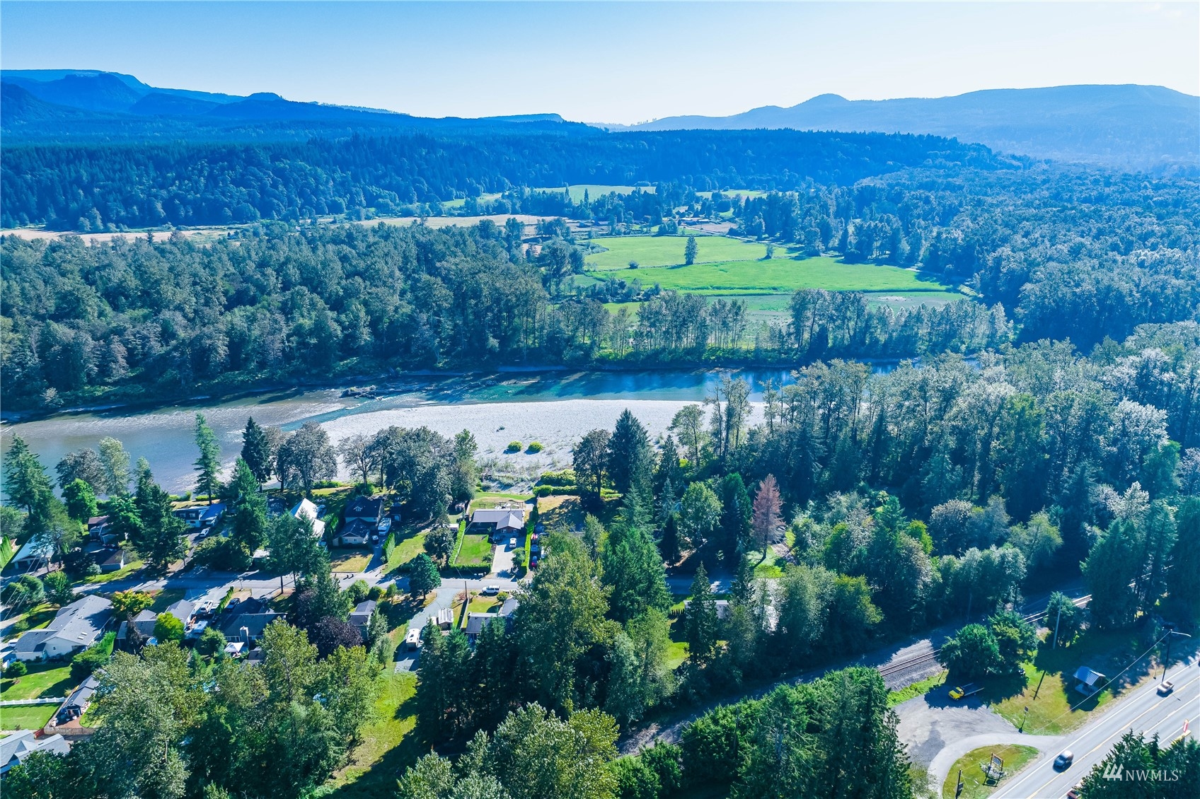 809 Dyer Road Sultan, WA 98294 - Photo 32 of 39 a view of a lush green hillside and houses