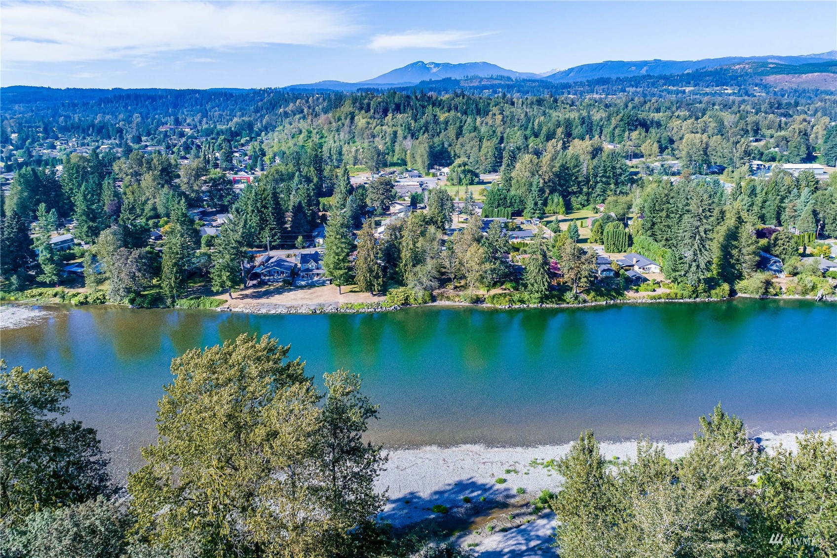 809 Dyer Road Sultan, WA 98294 - Photo 36 of 39 an aerial view of residential houses with outdoor space and lake view