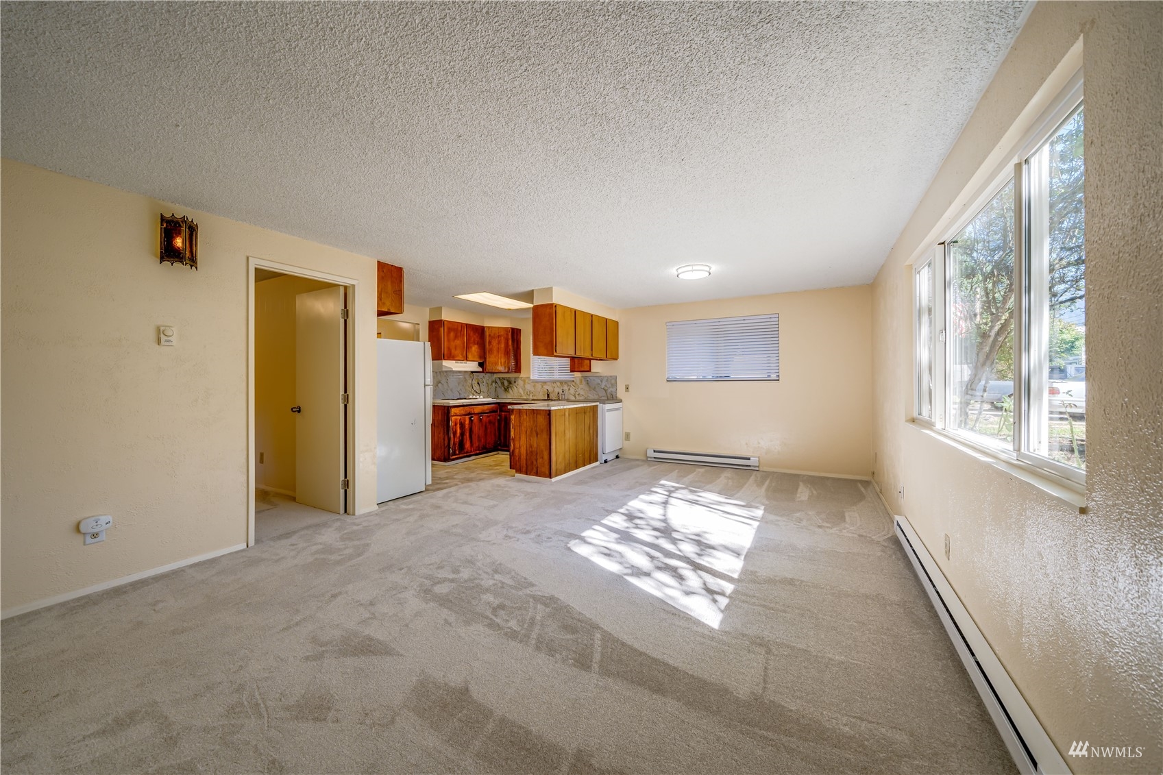 809 Dyer Road Sultan, WA 98294 - Photo 4 of 39 a view of an empty room with a window