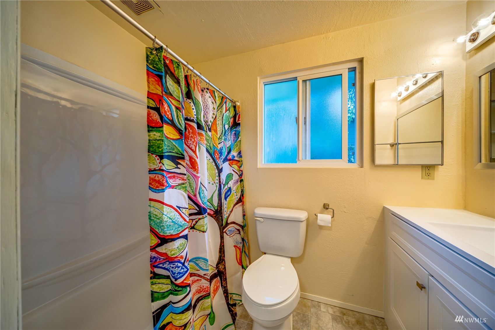 809 Dyer Road Sultan, WA 98294 - Photo 10 of 39 a white toilet sitting next to a bathroom sink