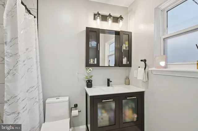 a view of a storage & utility room with washer and dryer
