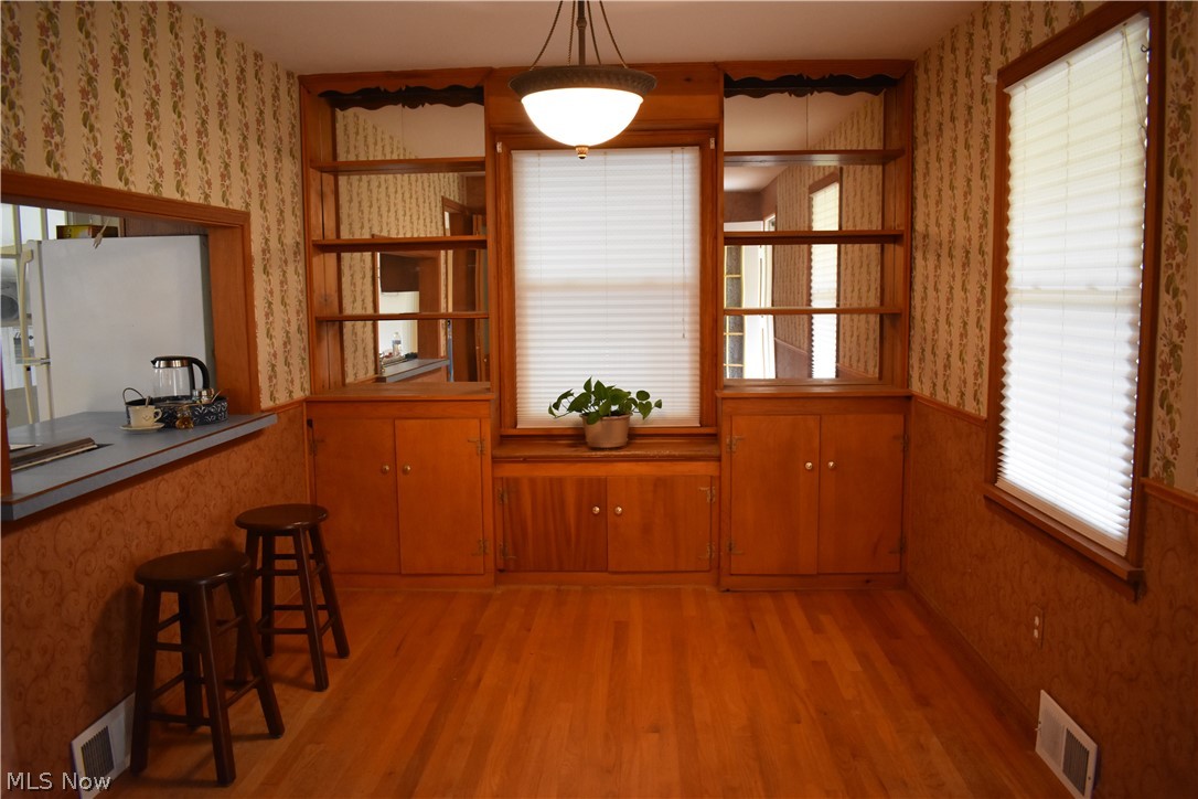 10261 Chardon Road Chardon, OH 44024 - Photo 14 of 33 Dining room offers built-ins and breakfast bar that opens into the kitchen.