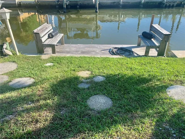a view of house with outdoor space and sitting area