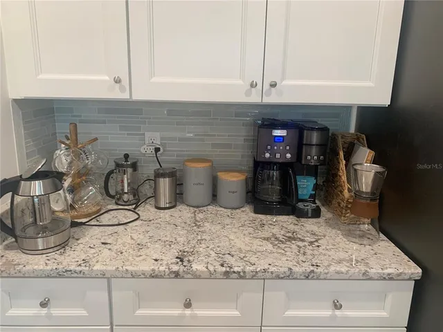 a bathroom with a shower and a toilet