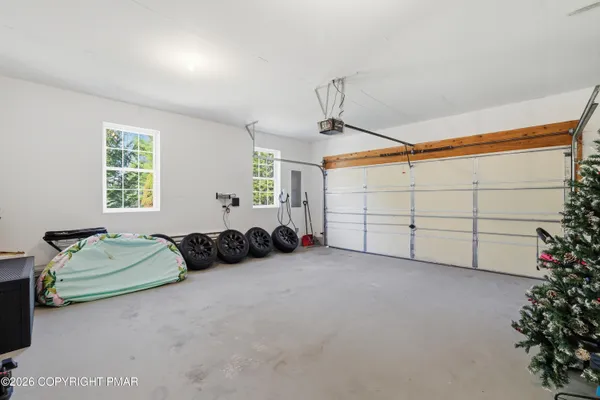 a view of a livingroom with furniture and toys