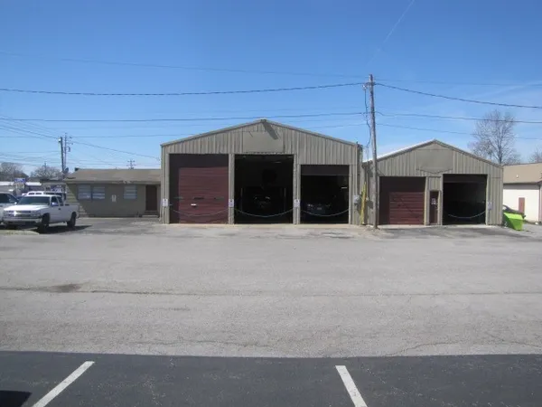a view of a street with cars