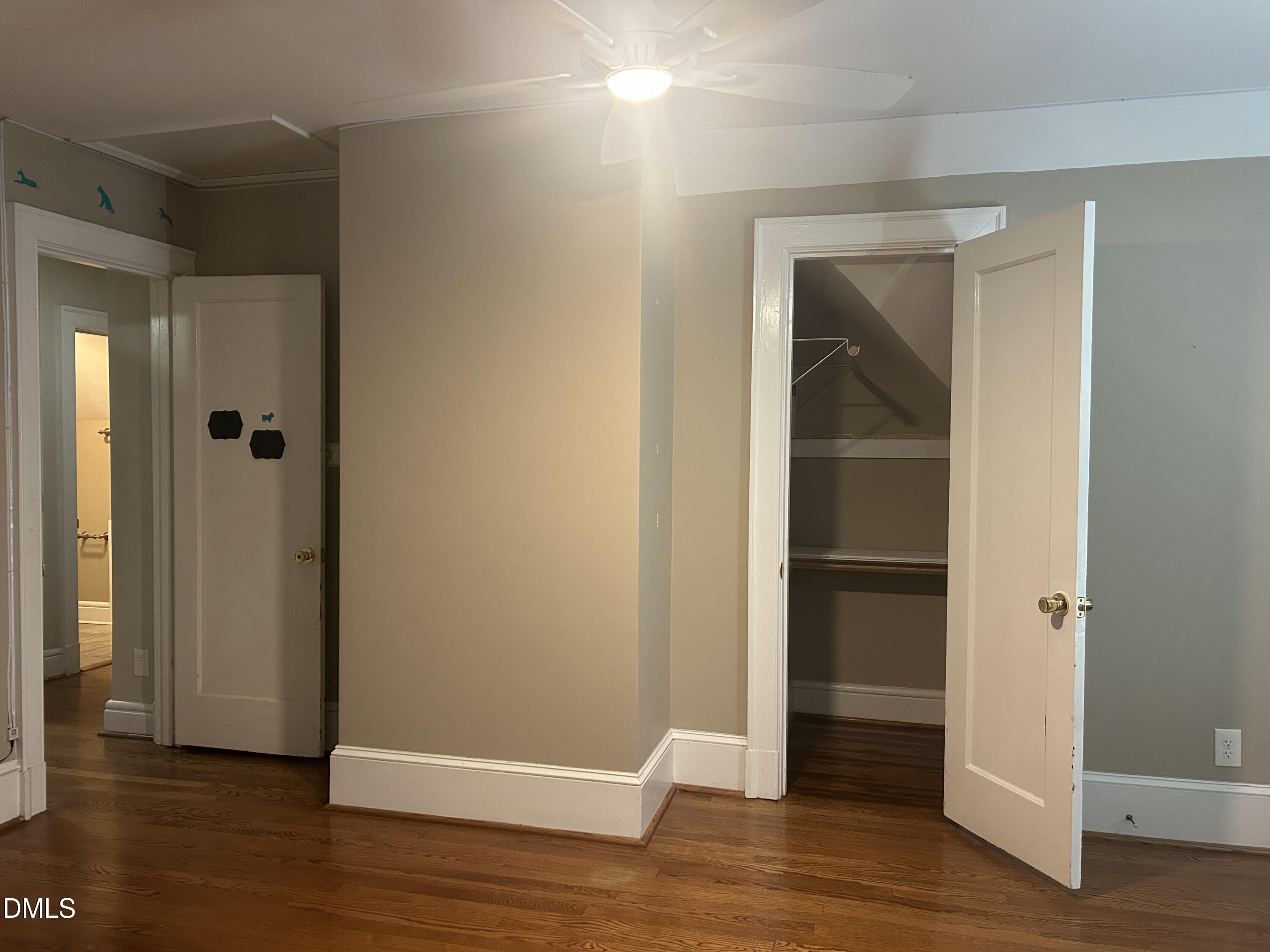 405 Sunset Avenue Clinton, NC 28328 - Photo 18 of 47 a view of empty room with wooden floor