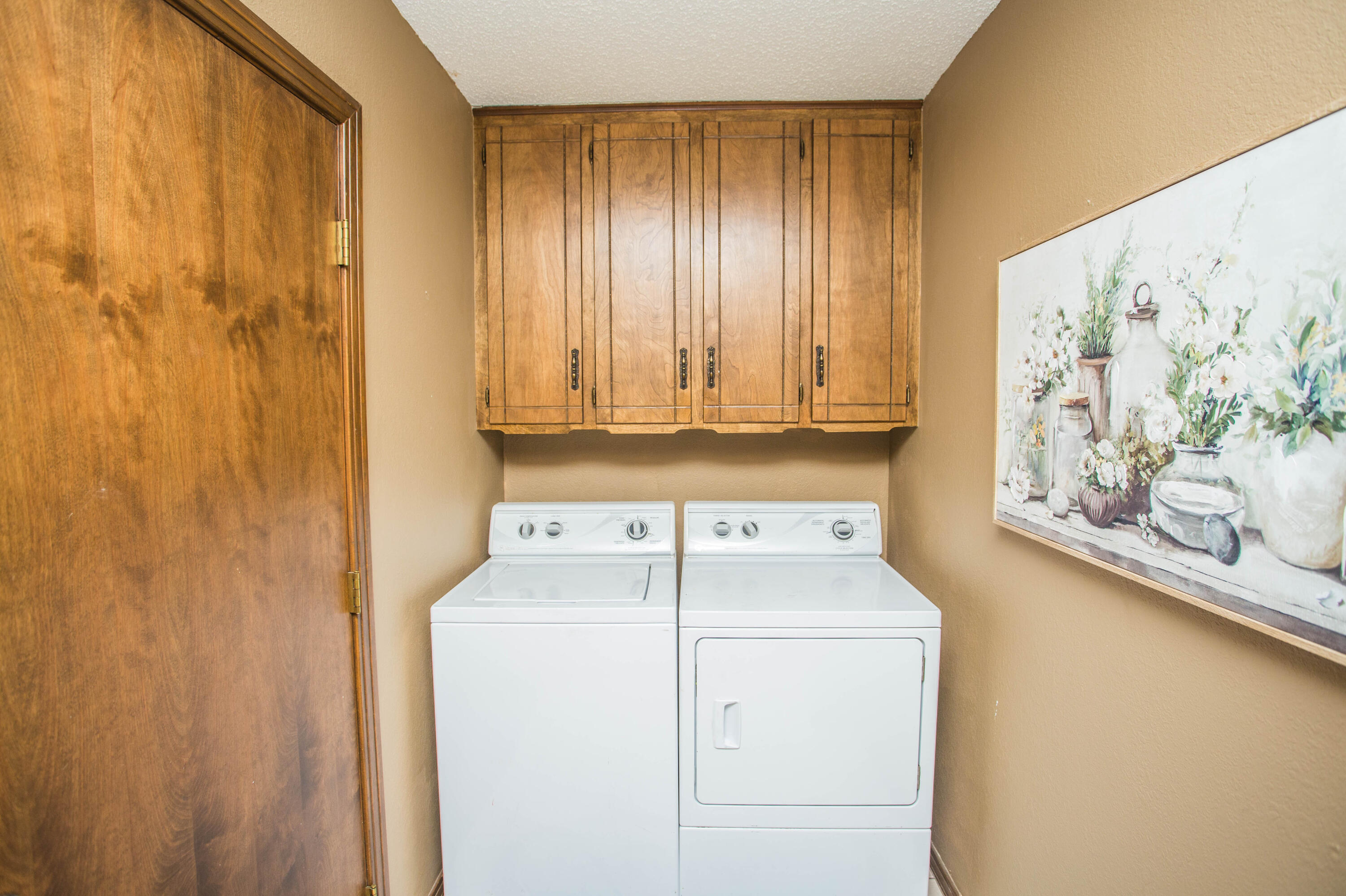 1304 Jefferson Drive Plainview, TX 79072 - Photo 24 of 50 a utility room with dryer and washer