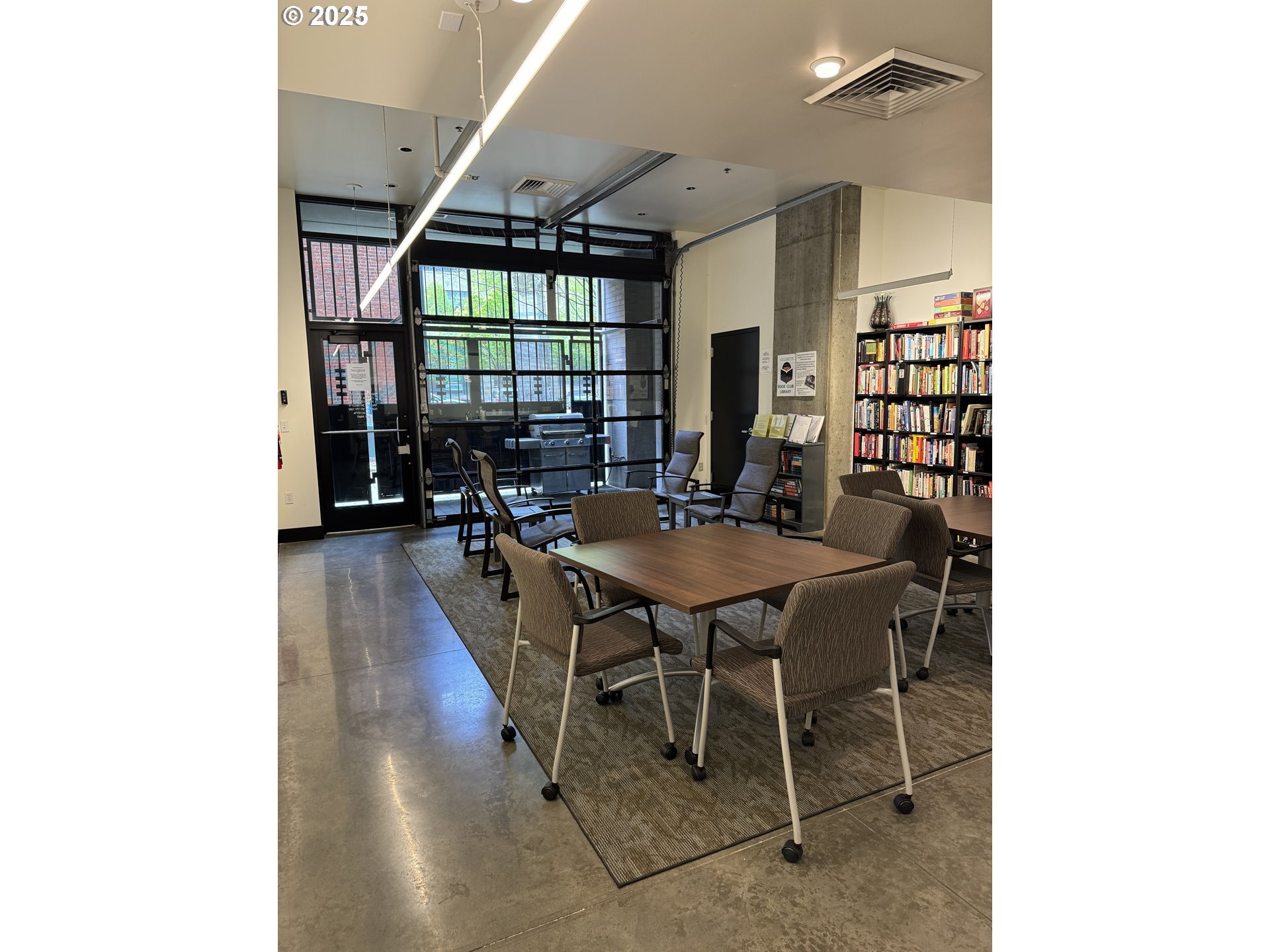 333 Northwest 9th Avenue, Unit 411 Portland, OR 97209 - Photo 28 of 32 a dining room with furniture and a potted plant
