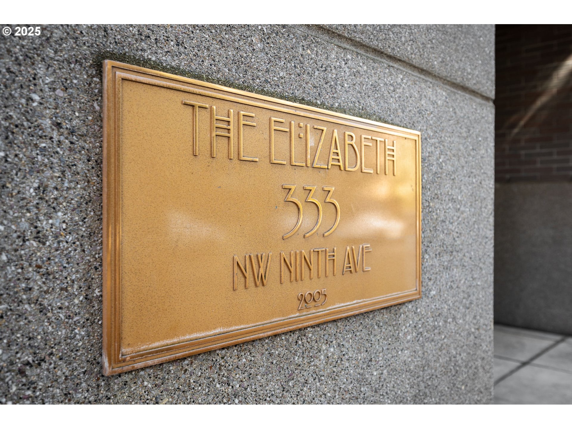 333 Northwest 9th Avenue, Unit 411 Portland, OR 97209 - Photo 31 of 32 a sign on the side of a building