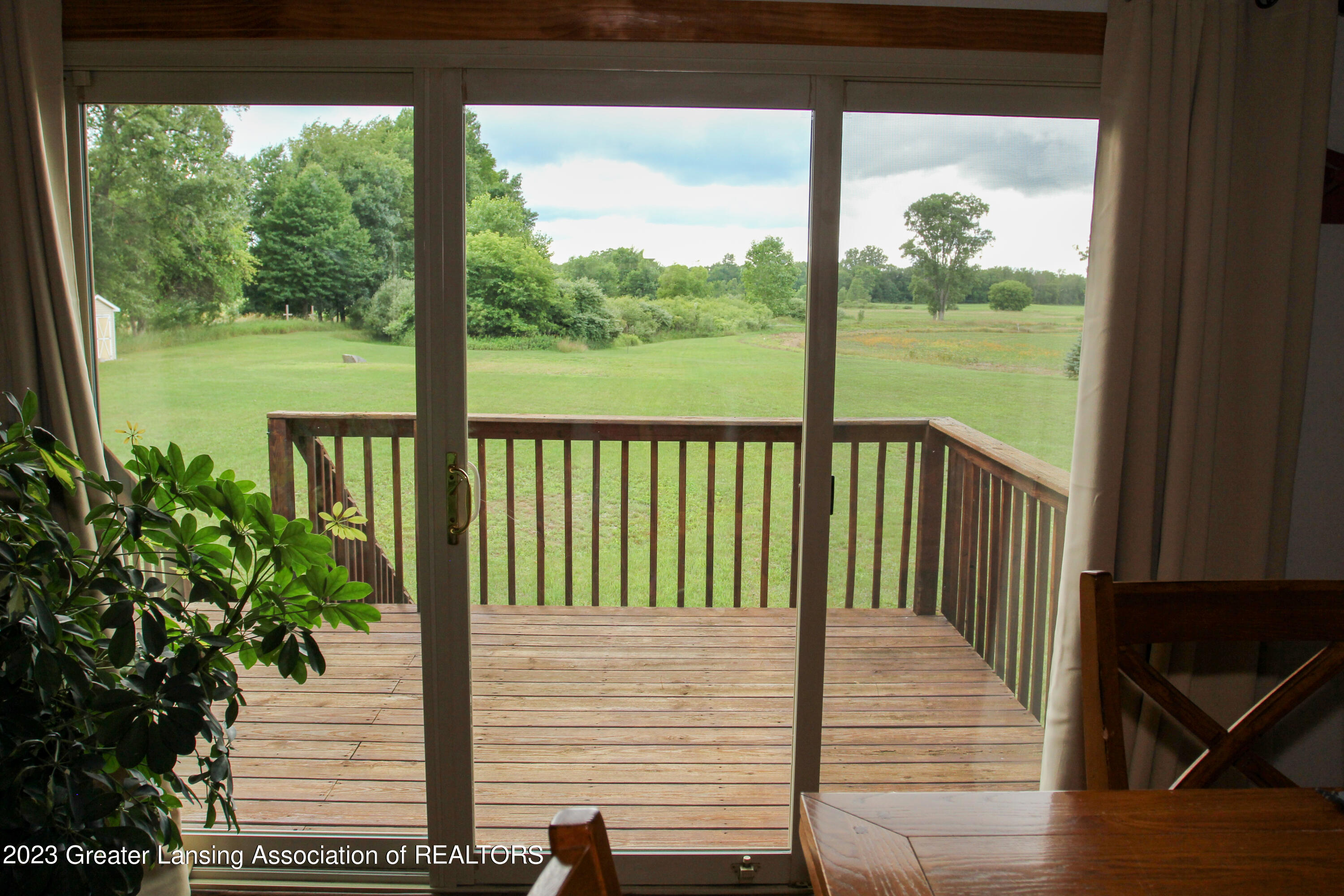 4100 South Williams Road Stockbridge, MI 49285 - Photo 30 of 71 Rear Deck from Dining Room