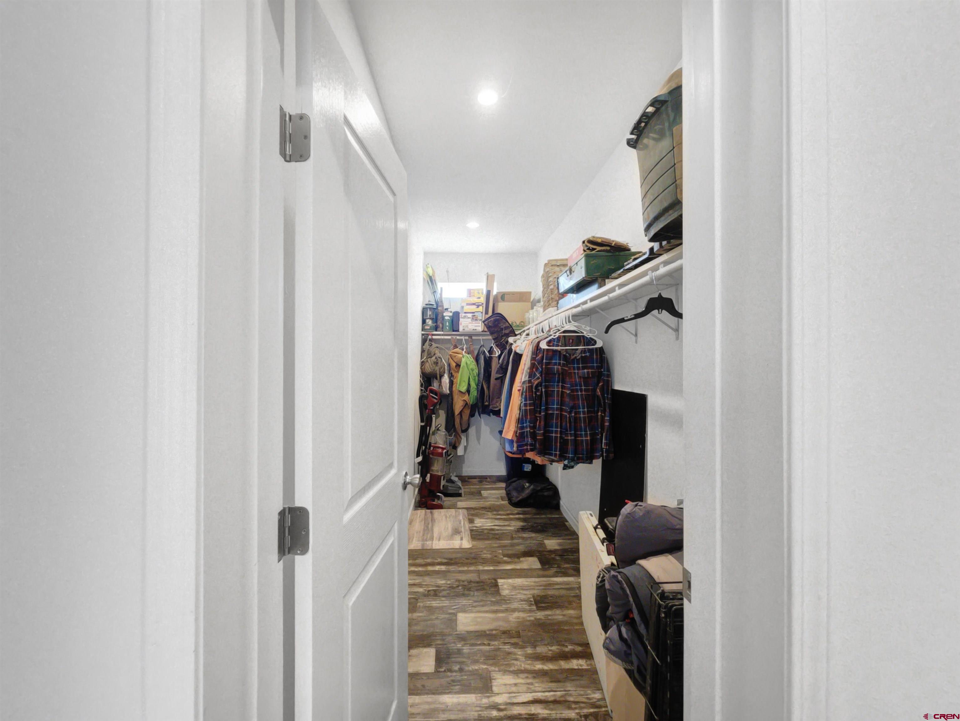 28454 Lampshire Road Hotchkiss, CO 81419 - Photo 20 of 45 a view of a hallway with a couch