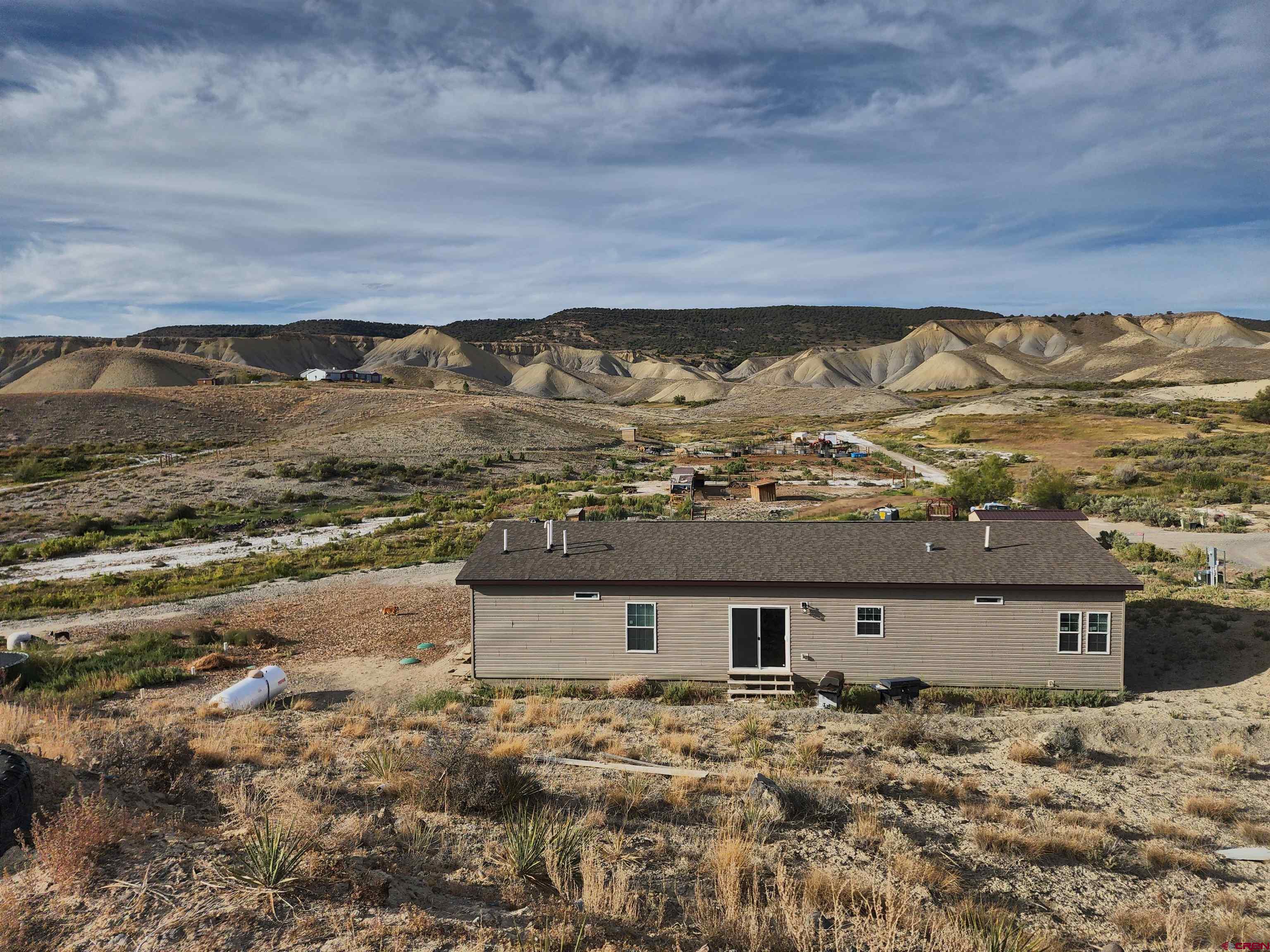 28454 Lampshire Road Hotchkiss, CO 81419 - Photo 4 of 45 a view of house with ocean view