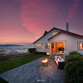 a front view of a house with yard