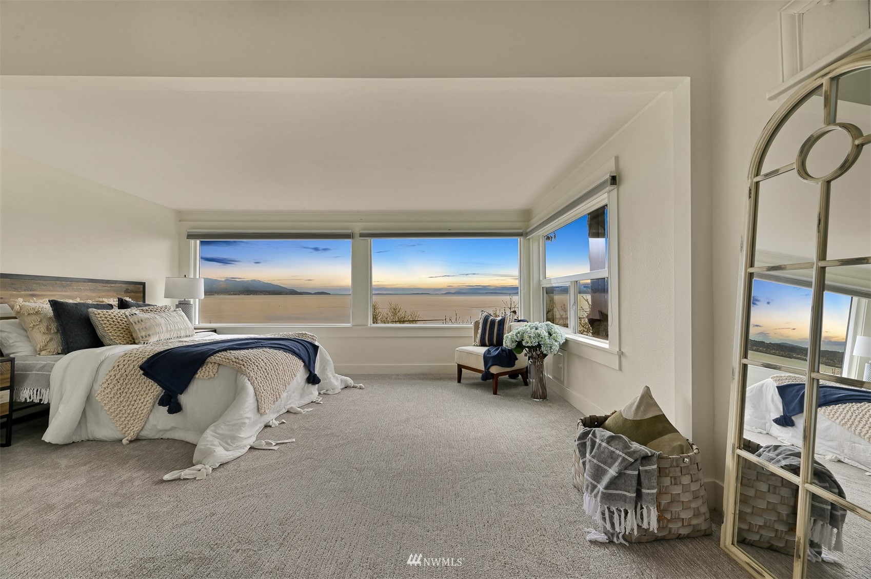3796 Bancroft Road Bellingham, WA 98225 - Photo 16 of 38 a spacious bedroom with a bed and a large window