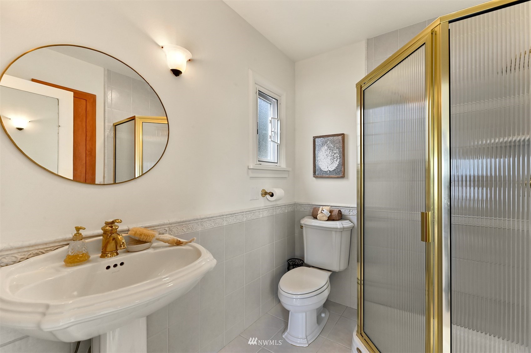 3796 Bancroft Road Bellingham, WA 98225 - Photo 18 of 38 a bathroom with a toilet sink and mirror