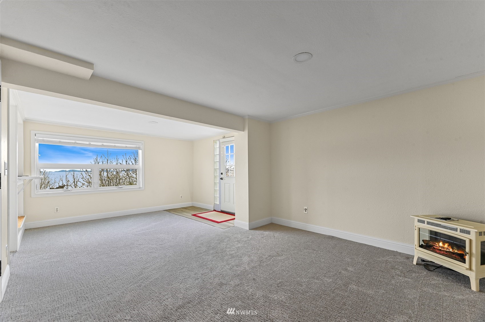 3796 Bancroft Road Bellingham, WA 98225 - Photo 25 of 38 a view of an empty room with a window