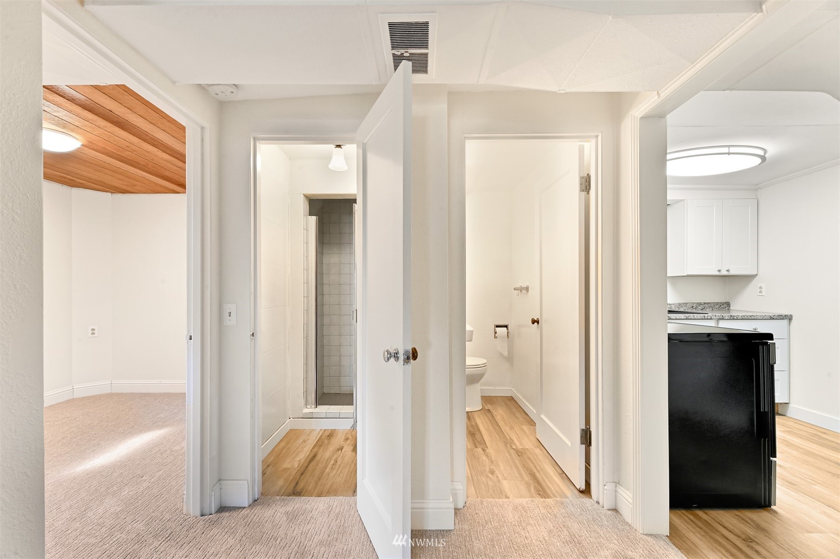 3796 Bancroft Road Bellingham, WA 98225 - Photo 27 of 38 a view of a bathroom with a tub and shower