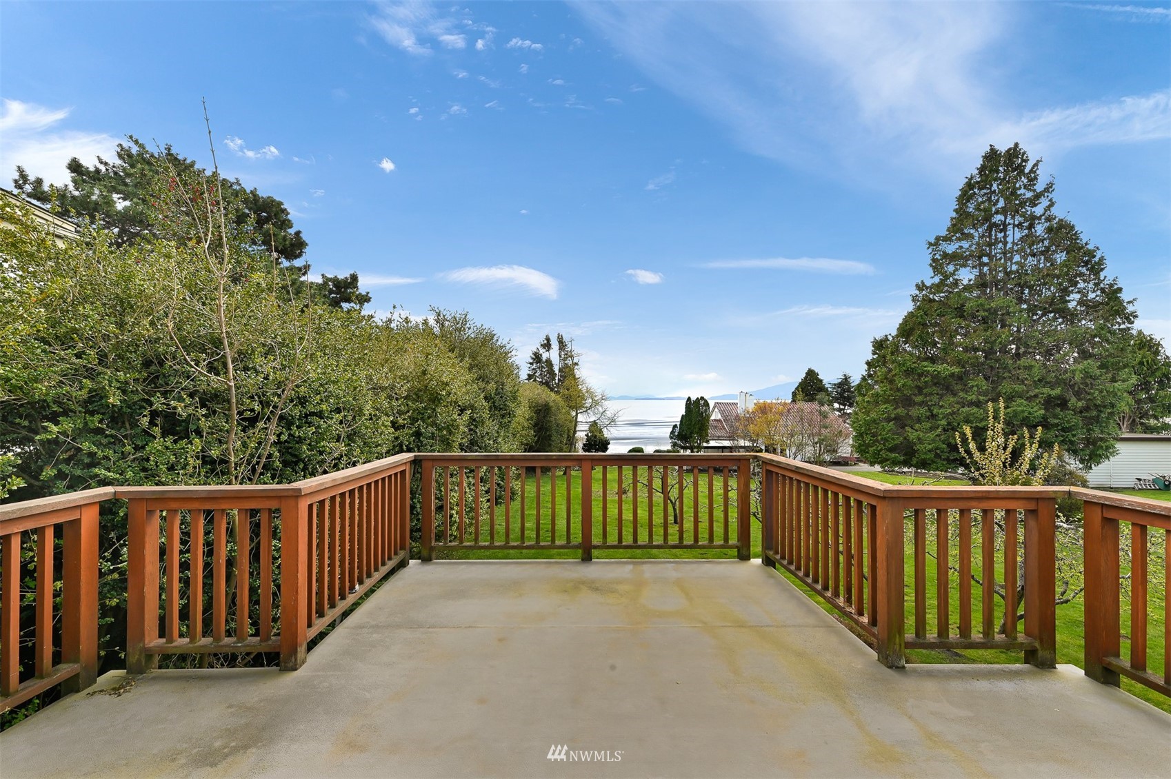 3796 Bancroft Road Bellingham, WA 98225 - Photo 35 of 38 a view of a roof with wooden fence
