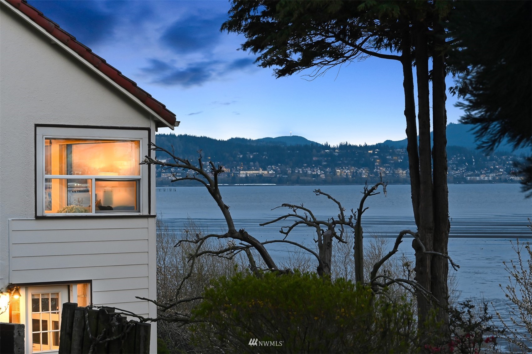 3796 Bancroft Road Bellingham, WA 98225 - Photo 37 of 38 a view of a balcony with chairs and a table