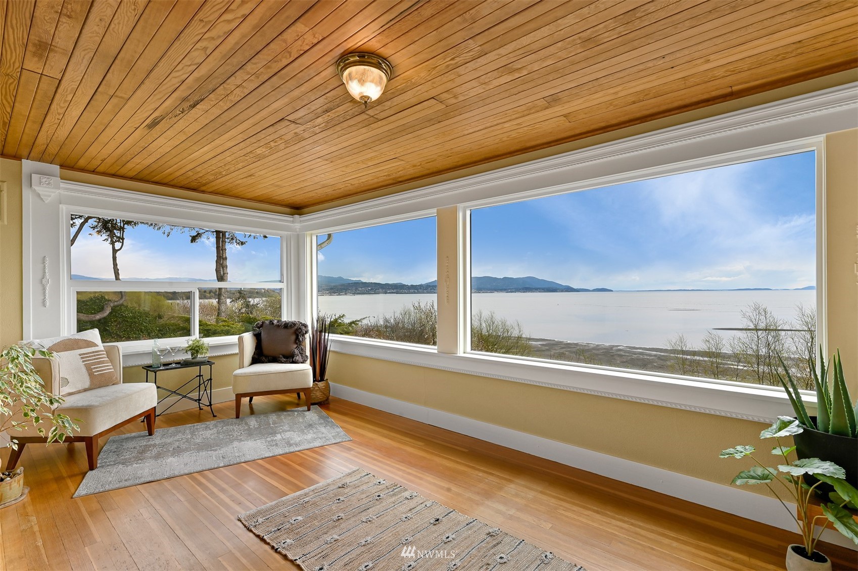 3796 Bancroft Road Bellingham, WA 98225 - Photo 6 of 38 a living room with furniture and a floor to ceiling window