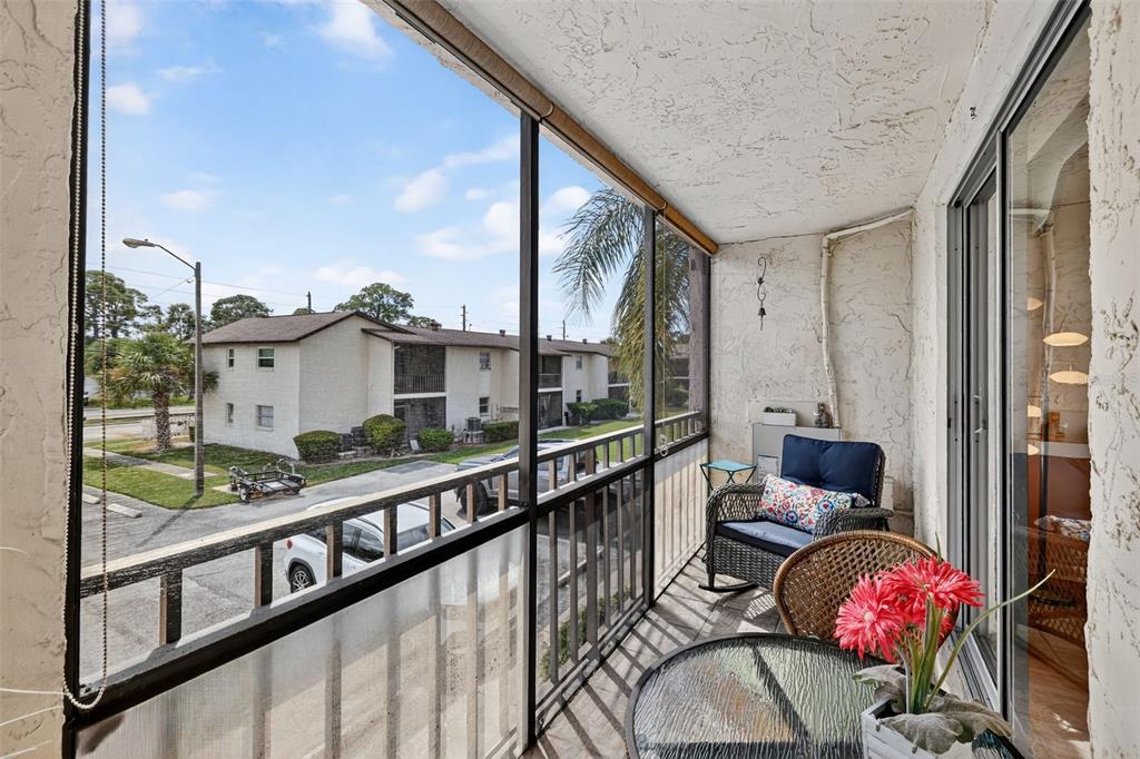 5541 Bay Boulevard, Unit 203 Port Richey, FL 34668 - Photo 22 of 30 a view of balcony with furniture