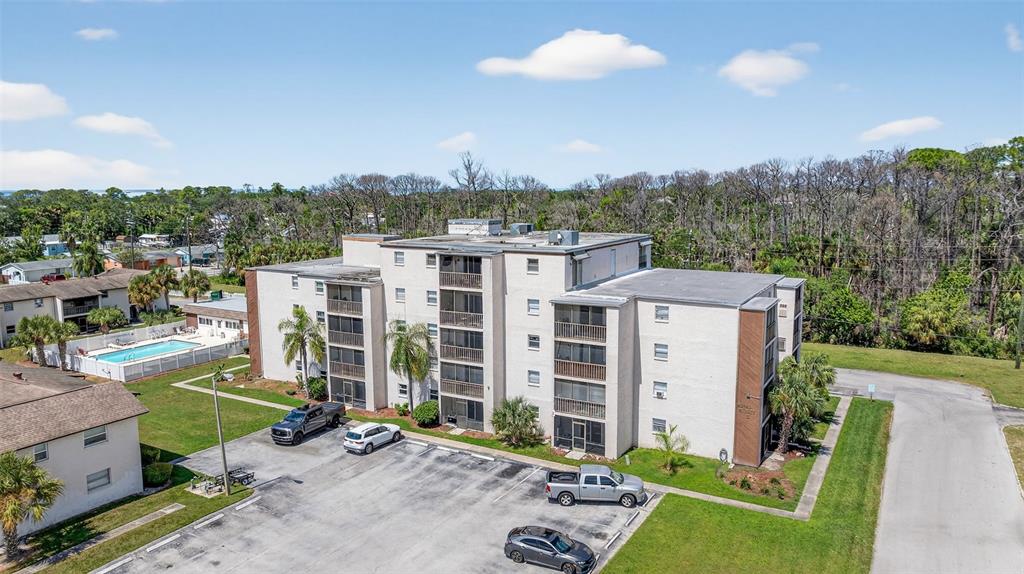 5541 Bay Boulevard, Unit 203 Port Richey, FL 34668 - Photo 25 of 30 a view of a city with tall buildings