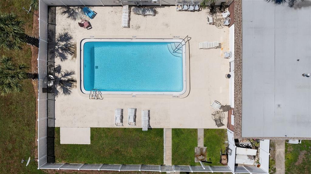 5541 Bay Boulevard, Unit 203 Port Richey, FL 34668 - Photo 29 of 30 a bathroom with a sink and a mirror