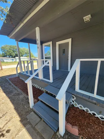 a view of swimming pool with a sitting space