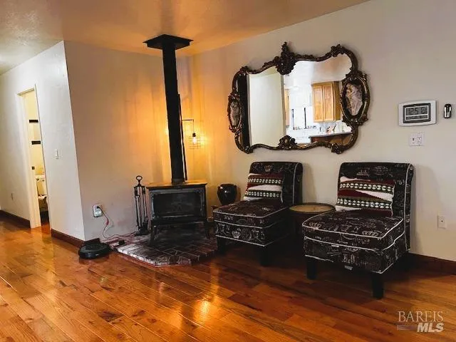 a kitchen with a refrigerator and a stove