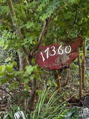 a sign that is on a tree