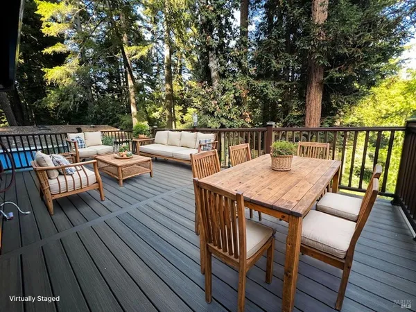 a bedroom with two beds and a chandelier