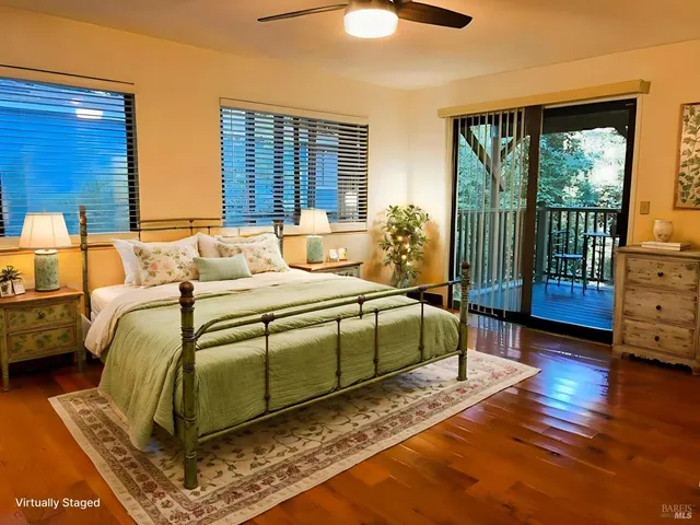 a bathroom with a double vanity sink mirror and toilet