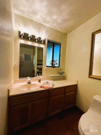 a view of a balcony with wooden floor outdoor seating and wooden floor