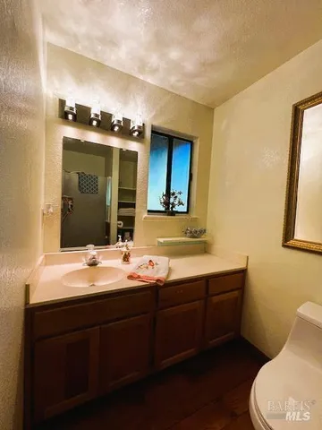 a view of a balcony with wooden floor outdoor seating and wooden floor