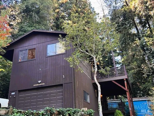a front view of a house with yard