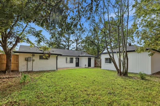 703 Reseda Drive Houston, TX 77062 - Photo 23 of 25 front view of house with a yard