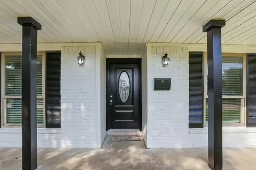 a front view of a house with entryway
